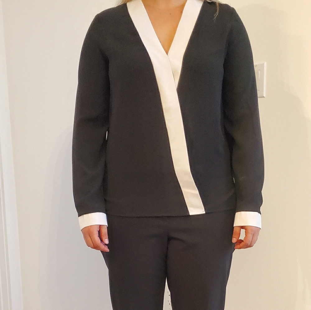 Black 1. State blouse with off-white trim